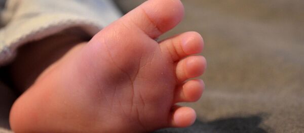 Un pie de bebé - Sputnik Mundo