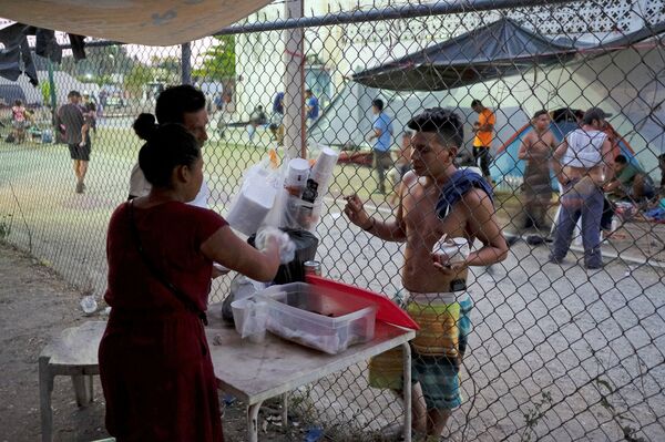 Migrantes centroamericanos en Mapastepec, Chiapas, México - Sputnik Mundo