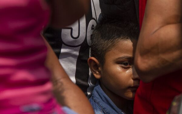 Tapachula, Chiapas. Niño durante el camino del Vía Crucis cubano que alquilo autobuses para llegar a la frontera norte - Sputnik Mundo