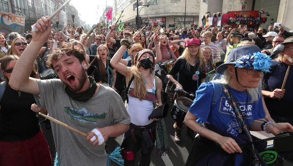 Activistas contra el cambio climático se manifiesta en Londres - Sputnik Mundo