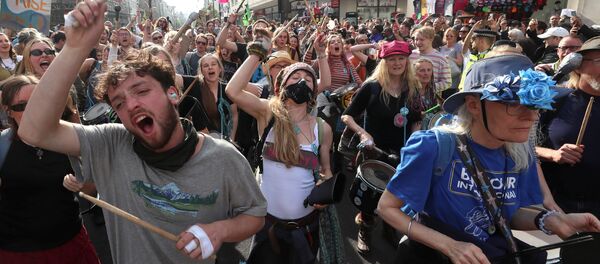 Activistas contra el cambio climático se manifiesta en Londres - Sputnik Mundo
