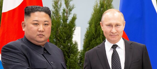El líder de Corea del Norte, Kim Jong-un, y el presidente de Rusia, Vladímir Putin - Sputnik Mundo