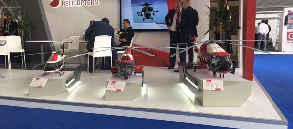 Miniaturas de modelos producidos por Helicópteros de Rusia, en exhibición en FAMEX 2019 - Sputnik Mundo