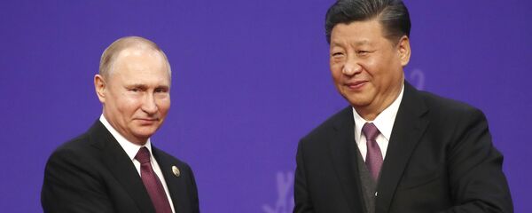 El presidente de Rusia, Vladímir Putin, y el presidente de China, Xi Jinping - Sputnik Mundo
