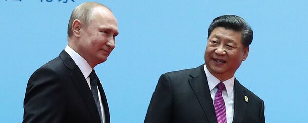 El presidente de Rusia, Vladímir Putin, y el presidente de China, Xi Jinping - Sputnik Mundo
