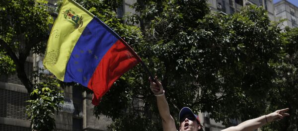 Una manifestación opositora en Caracas - Sputnik Mundo
