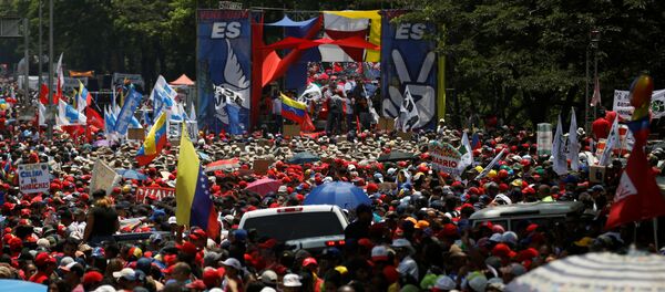 Una marcha en Caracas, Venezuela - Sputnik Mundo