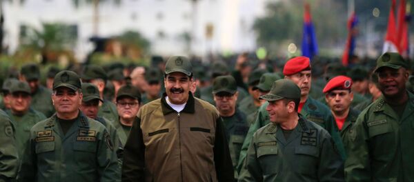 Nicolás Maduro, presidente de Venezuela durante la marcha militar en Caracas - Sputnik Mundo