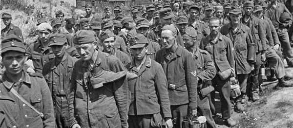 Unos presos alemanes en Bielorrusia - Sputnik Mundo