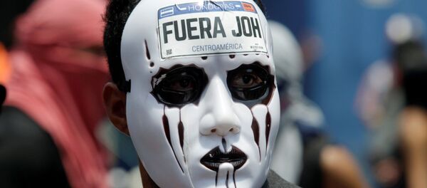 Una protesta antigubernamental en Honduras - Sputnik Mundo