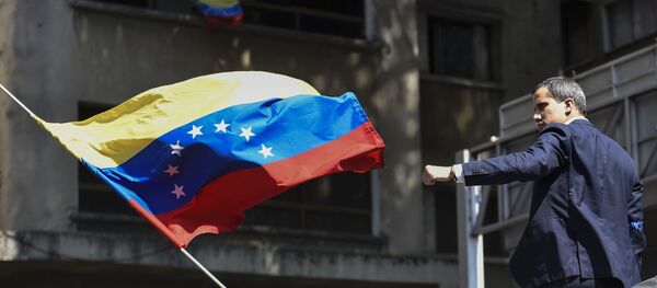 Juan Guaidó, líder opositor de Venezuela, en una manifestación a favor de él Juan Guaidó, líder opositor de Venezuela, en una manifestación a favor de él - Sputnik Mundo