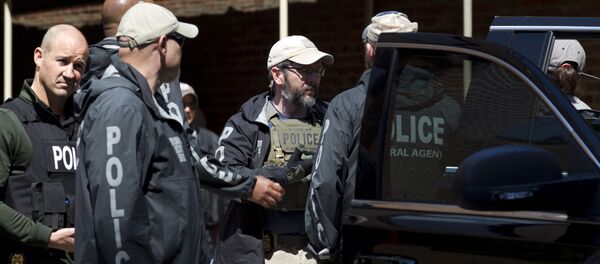 Agentes federales de EEUU tras irrumpir en la embajada venezolana - Sputnik Mundo
