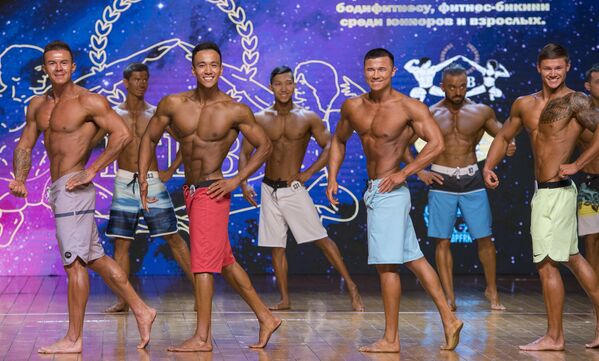 Espectáculo de músculos en el Campeonato de 'Bodybuilding' asiático Espectáculo de músculos en el Campeonato de 'Bodybuilding' asiático - Sputnik Mundo