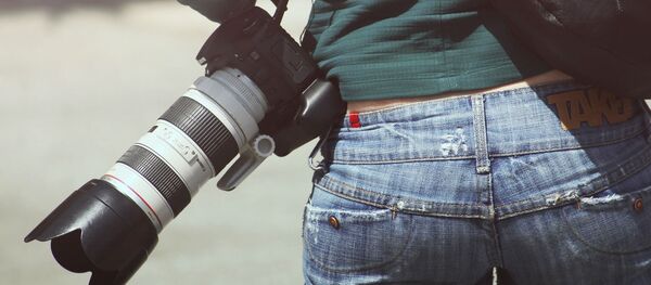 Una fotógrafa (archivo) - Sputnik Mundo