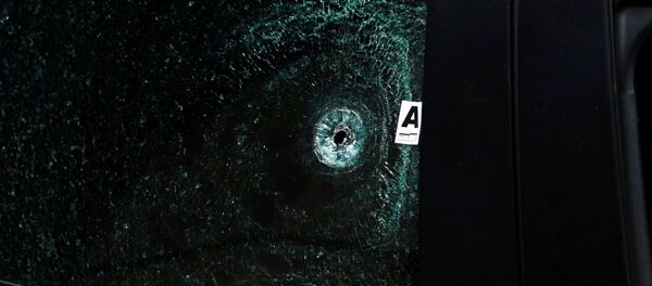 Disparo en el vidrio de un automóvil en México - Sputnik Mundo