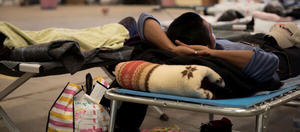 Un migrante mexicano Un migrante mexicano - Sputnik Mundo