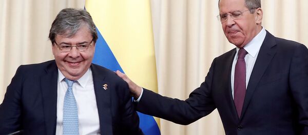El canciller colombiano, Carlos Holmes Trujillo, con su par ruso, Serguéi Lavrov El canciller colombiano, Carlos Holmes Trujillo, con su par ruso, Serguéi Lavrov - Sputnik Mundo