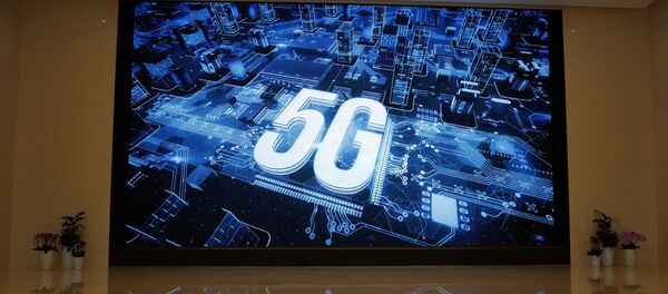 El logo de 5G en la sede de Huawei - Sputnik Mundo
