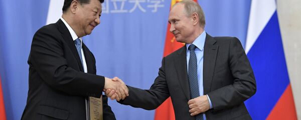 Presidente de China, Xi Jinping, y presidente de Rusia, Vladímir Putin - Sputnik Mundo