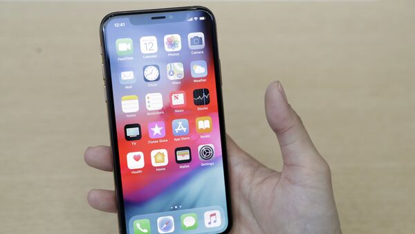 Un iPhone XS - Sputnik Mundo