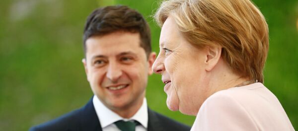 Angela Merkel, canciller de Alemania, y Volodímir Zelenski, presidente de Ucrania, durante su encuentro el 18 de junio de 2019 Angela Merkel, canciller de Alemania, y Volodímir Zelenski, presidente de Ucrania, durante su encuentro el 18 de junio de 2019 - Sputnik Mundo