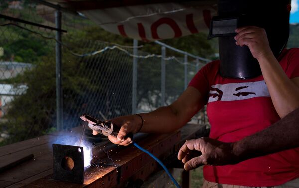 La construcción de los edificios que conformarán el complejo urbanístico llamado 'Jorge Rodríguez Padre', que cuenta con el apoyo financiero del Gobierno La construcción de los edificios que conformarán el complejo urbanístico llamado 'Jorge Rodríguez Padre', que cuenta con el apoyo financiero del Gobierno - Sputnik Mundo