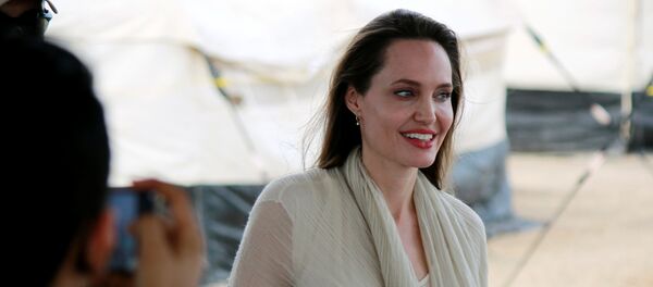 Angelina Jolie, actriz hollywoodense - Sputnik Mundo