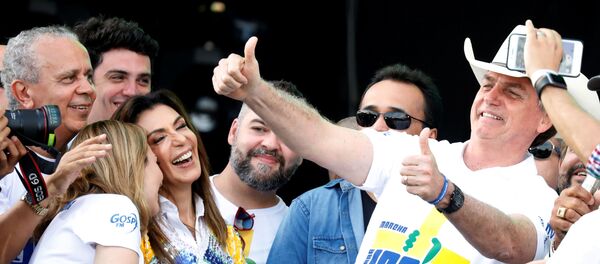 Jair Bolsonaro, presidente brasileño, durante una marcha evangélica en Sao Paulo, Brasil Jair Bolsonaro, presidente brasileño, durante una marcha evangélica en Sao Paulo, Brasil - Sputnik Mundo