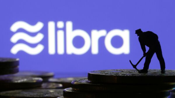 Logo de la criptodivisa libra de Facebook - Sputnik Mundo