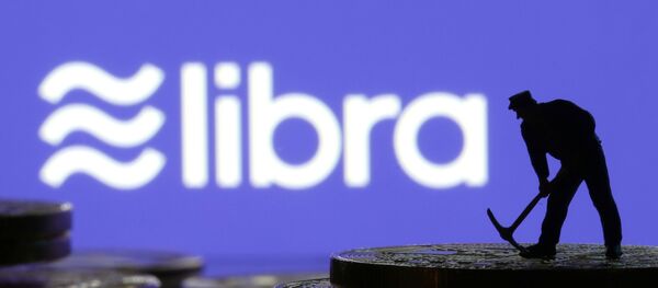 Logo de la criptodivisa libra de Facebook - Sputnik Mundo