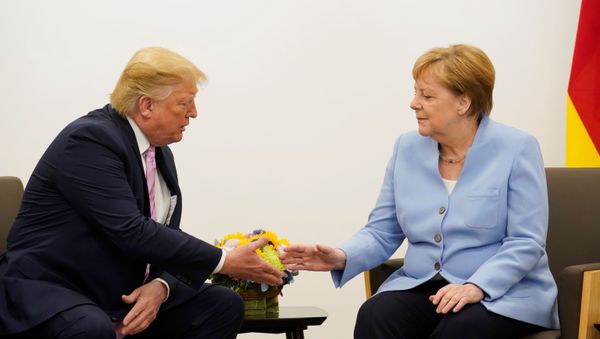 El presidente estadounidense, Donald Trump, y la canciller alemana, Angela Merkel El presidente estadounidense, Donald Trump, y la canciller alemana, Angela Merkel - Sputnik Mundo
