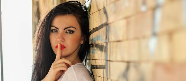 Una mujer - Sputnik Mundo