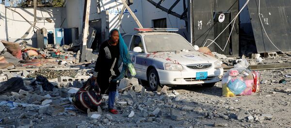 Ataque aéreo a un centro de detención de migrantes en la ciudad libia de Tajura - Sputnik Mundo