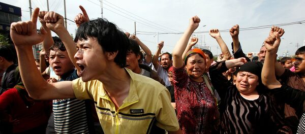 Las protestas étnicas en Xinjuang, región noroccidental de China - Sputnik Mundo