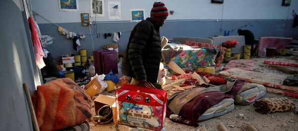 Un libio en el centro de detención de migrantes en Tajura tras el ataque - Sputnik Mundo