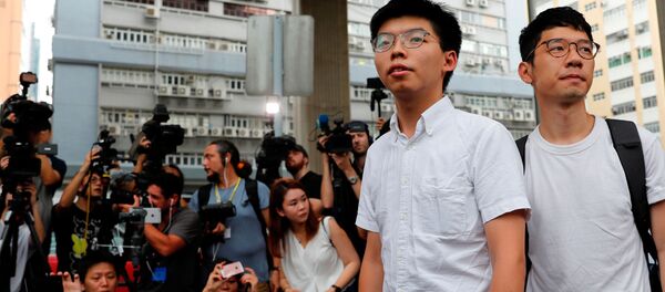 Estudiantes de Hong Kong tras las protestas Estudiantes de Hong Kong tras las protestas - Sputnik Mundo