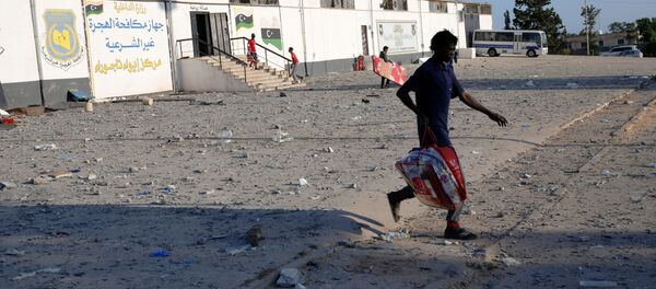 Consecuencias del ataque a un centro de detención de migrantes en Libia Consecuencias del ataque a un centro de detención de migrantes en Libia - Sputnik Mundo