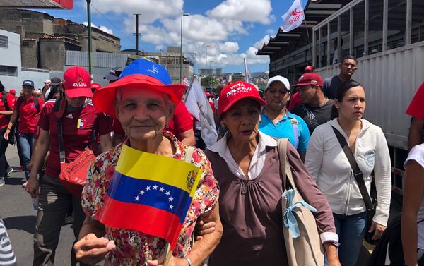 Marcha chavista durante el Día de la Independencia de Venezuela Marcha chavista durante el Día de la Independencia de Venezuela - Sputnik Mundo