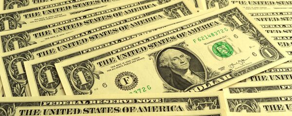Dólares estadounidenses (archivo) Dólares estadounidenses (archivo) - Sputnik Mundo
