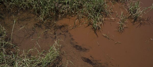 Consecuencias de la ruptura de la represa minera (imagen referencial) - Sputnik Mundo