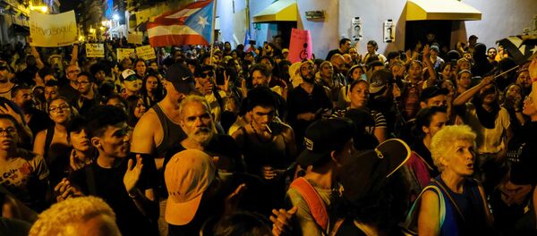 Protesta reclamando la renuncia del gobernador de Puerto Rico, Ricardo Rosselló - Sputnik Mundo