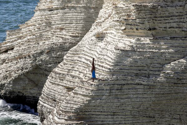 Desfiles de moda, natación sincronizada y ovejas: estas son las imágenes de la semana - Sputnik Mundo