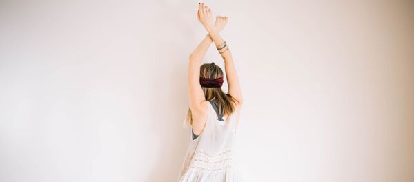 Una chica bailando (imagen referencial) Una chica bailando (imagen referencial) - Sputnik Mundo