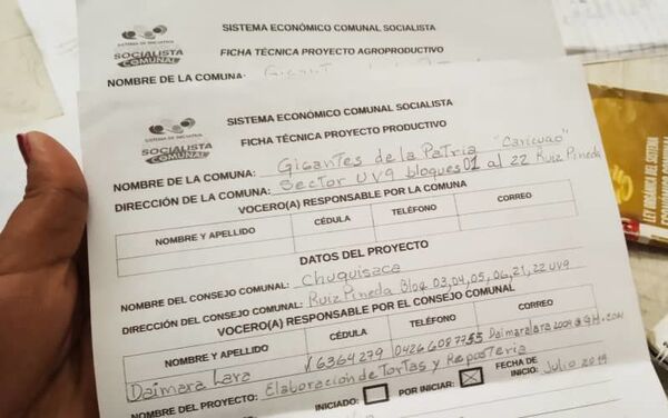 Documento del Sistema de Iniciativa Económica Socialista Comunal de Caracas, Venezuela Documento del Sistema de Iniciativa Económica Socialista Comunal de Caracas, Venezuela - Sputnik Mundo