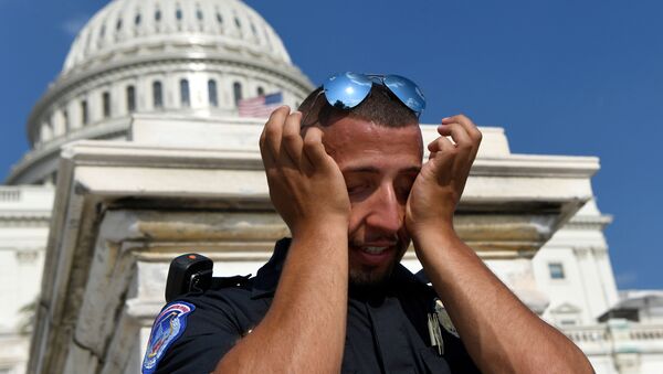 Policía suda durante la ola de calor que afecta EEUU (archivo) - Sputnik Mundo