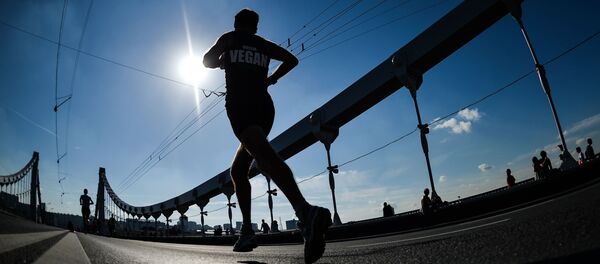Un maratoniano (imagen referencial) Un maratoniano (imagen referencial) - Sputnik Mundo
