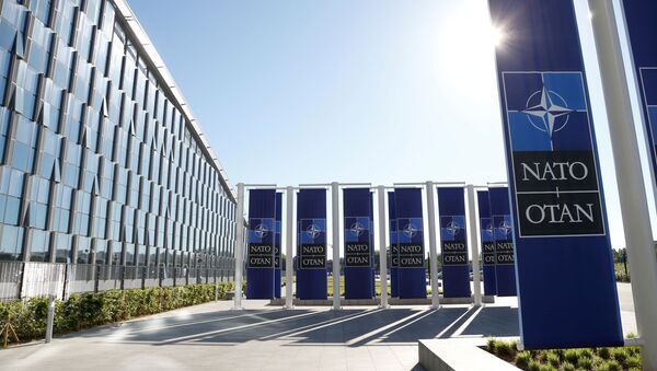 Logo de la OTAN - Sputnik Mundo
