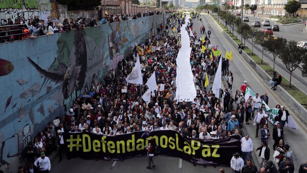 Protesta en Bogotá por los asesinatos de los líderes sociales en Colombia - Sputnik Mundo