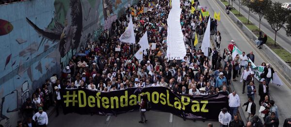 Protesta en Bogotá por los asesinatos de los líderes sociales en Colombia - Sputnik Mundo