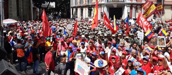 Los seguidores del Gobierno se movilizan en Caracas para apoyar el Foro de Sao Paulo - Sputnik Mundo